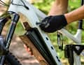The battery can be released with a spanner and folded forwards out of the down tube in the classic way.