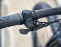 The system is operated via a slim remote lever located close to the handle.