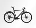 Fully equipped with mudguards, a luggage rack, an 11-speed Shimano gear system and a diamond-shaped frame.