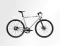 The single-speed version with Gates carbon belts does not feature mudguards or a luggage rack ...