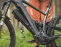 The large 800 Wh battery folds forwards out of the down tube and is secured with a key.