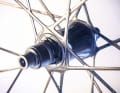 In the Silverton SL wheels, the rims, spokes and the ring for the hub mount are laminated from a single piece.  The carbon hub shell is then bonded between the spoke shields under high tension.