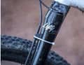 In the long run, the strength of the double-sided adhesive tape under the fork's cable routing was exhausted. Now a cable tie has to be used.