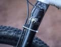 In the long run, the strength of the double-sided adhesive tape under the cable routing of the fork slackened. Now a cable tie has to be used.