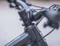 The high front end and the very short stem shift the centre of gravity far behind the front wheel axle. Less spacers and a longer stem can help.