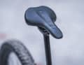The smooth surface material of the saddle makes it easy to slip backwards on steep climbs.
