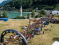 600 bikers take part in the anniversary stage from Nauders to Riva. Here they start the second stage at Lake Reschen.