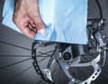 3 Align the brake disc: If the disc grinds irregularly and "wobbles" despite the brake calliper being adjusted, it is warped.  In this case, carefully straighten the brake disc using a straightening tool or your hands and a cloth to protect it from grease.