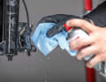 Use a clean cloth and degreasing cleaning agent (brake cleaner, isopropanol) to clean the caliper and piston.