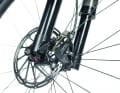 The air and damping unit are both located in the left fork leg. The right-hand side is practically empty.  This is intended to optimise force transmission and prevent tension when riding.