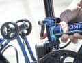 The unlocking mechanism is located behind the seat post. You also have to fold the rear wheel in when parking the bike, as there is no side stand.