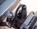 The plug sits on a solid holder directly on the coupling