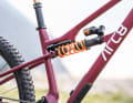 The dual pivot rear triangle design with slider linkage is already familiar from the Arc8 Essential and Evolve models.
