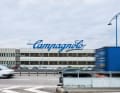 In the industrial area of Vicenza, the 36 metre long Campagnolo logo is hard to miss. The motorway separates the headquarters from the subsidiary Fulcrum