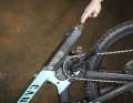 The battery is pulled downwards out of the bike.