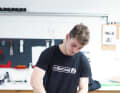 Before a frame can be created, the carbon mats must first be cut out using a cutter.