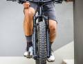 To prevent pain when pedalling, the knee should be perpendicular to the pedal or toes.