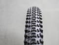 The closely spaced centre studs form an almost continuous centre bar.