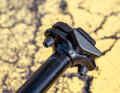 The saddle can be easily slid onto the slim saddle mount without having to completely loosen a screw