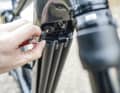 Then the battery, which is secured with a key, simply folds forwards out of the down tube.
