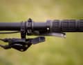 The double thumb lever especially for mountain bikes with flat bars