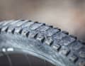 If an MTB tyre looks like this, it has had it. It used to end up in an incinerator. Today, it is turned into a new tyre.