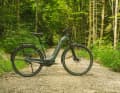 The e-touring bike comes with a classic diamond frame - or, as shown here, as a step-through model in a chic green colour.