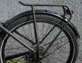 Classic touring rack: The stiff tube holds the panniers far back.