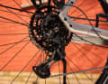 Shifting is done using either a Shimano Cues 9-speed...