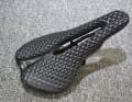 The Race saddle is tighter at the sit bones and softer towards the cut-out.