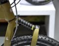 The front suspension is provided by the usual parallelogram fork.