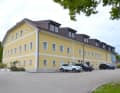 Un manoir vieux de plus de 800 ans à Mondsee, près de Salzbourg, est le siège social depuis 11 ans.