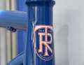 The legendary logo - and a modern steering head with tapered bearings.