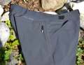 Adjustable waistband, front trouser pockets and one on each hip.