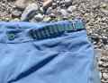 They have an adjustable waistband, but this can pinch under the hip bag.