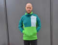 The Norrøna lofoten Thermal Pro Hoody has a large belly pocket. The light green areas are airier, the darker areas are more insulating.