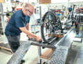 You won't find it in any two-wheeler factory: the self-made measuring stand is used to adjust the toe and camber of the wheels on trikes - for good directional stability and stable steering behaviour.