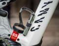 The Lezyne mini-pump has no room in the frame bag, it clings to the bottle cage.