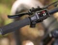 The Bosch Purion 200 combines remote levers and a small but crisp display directly on the handlebars. The foam rubber hexagonal grips are more traditional.