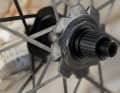 The carbon spokes are directly laminated onto the carbon hub flange.