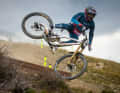 One of our all-time favourite photos: Dylan Maples riding the Commencal Supreme DH over a jump. The bike retailer has given the DH rider a facelift. Or rather, the bike!