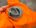 Here’s how it works: just pop the valve cap on and the air can escape.