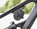 There is space under the top tube for a spare inner tube - there is no storage compartment.