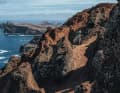 Barspin with backdrop: Kriss Kyle in Madeira's volcanic landscape during filming.