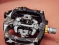 The binding mechanism is pivoted and is designed to help you get into the pedal. In practice, this works quite well.