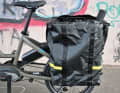 Simple, but ingenious and resilient: child seat in the Stormbox, can also be used for shopping and can be extended.
