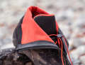 The inside is lined with Polartec material. The Blaze can be opened wide for easy access. Top: the speed laces for lacing