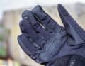 The trims on the fingers are touchscreen-compatible