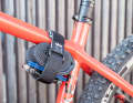The Rockband strap from Granite is the simplest and cheapest solution for transporting your tools on the frame