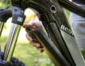 To remove the battery from the BESV, simply release the cover with a push button.